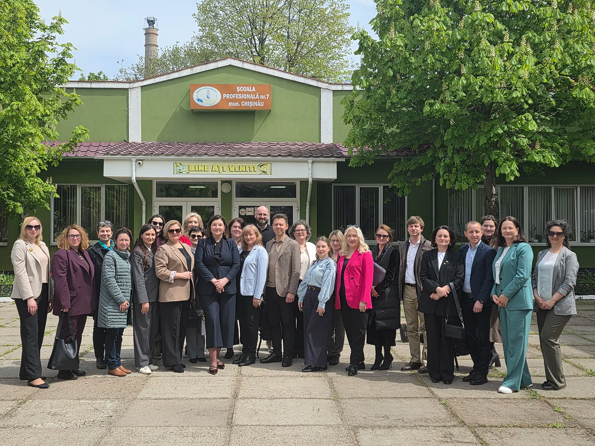 The Ukrainian delegation of the DECIDE project in front of the Vocational School No. 7 in Chișinău.