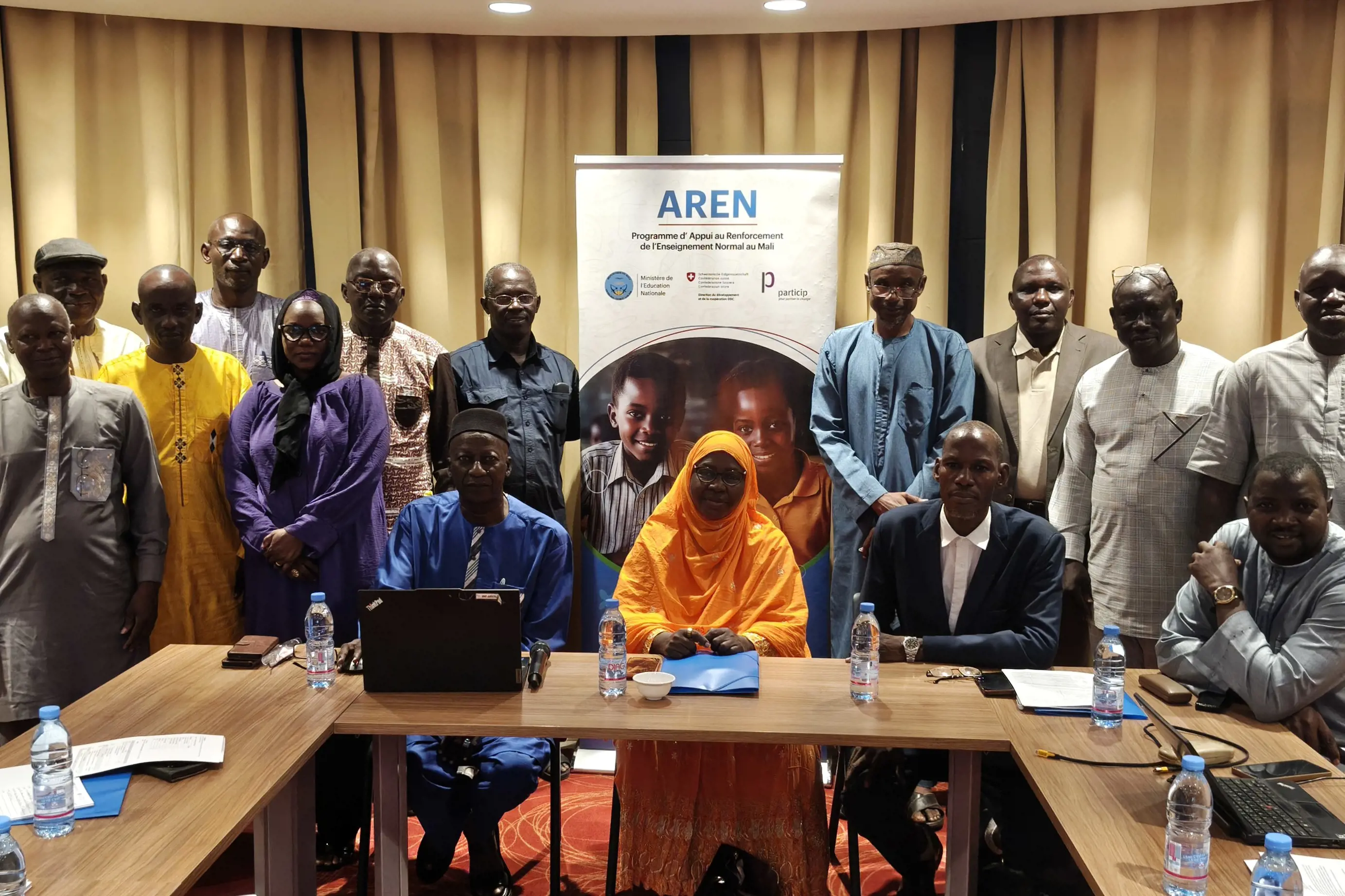 Malian course designers and tutors together with advisors of Particip and the director of the at one of the revision meetings in Bamako in August 2026.